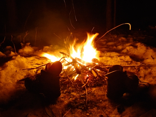 Reading Jack London by Fire - Drying Boots